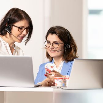 consumer-services-women-standing-desk-contact